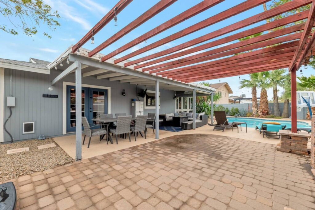 Scottsdale house with outside pergola dining area and pool