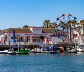 photo of Balboa Fun Zone in Newport Beach on the water with ferris wheel