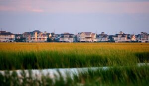 Waterfront homes at Bethany Beach, Delaware with coastal marsh views, a top Mid-Atlantic fall beach destination.