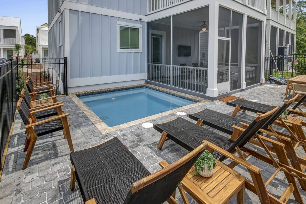 30A home with loungers and a dip pool 