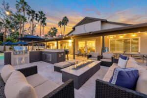 Beautiful spacious home with outdoor seating in Scottsdale and a firepit area