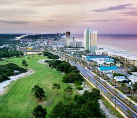 Overhead view of Panama City Beach restaurants, hotels, and short-term rental homes on Front Beach Road