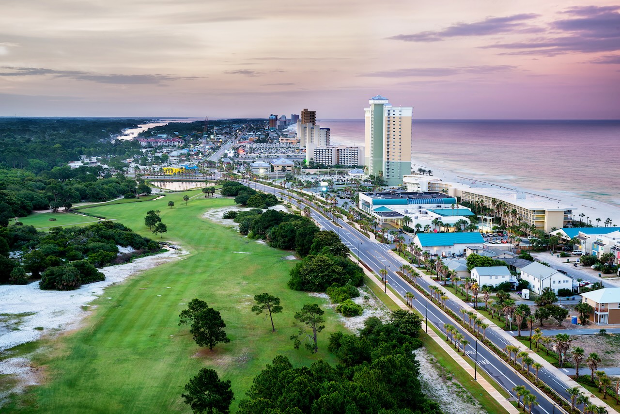 Overhead view of Panama City Beach restaurants, hotels, and short-term rental homes on Front Beach Road