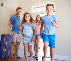Parents and kids excited to stay at vacation rental property