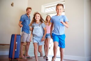 Parents and kids excited to stay at vacation rental property