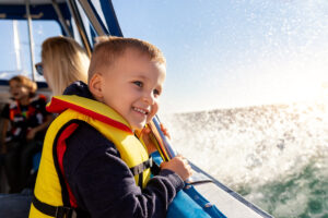 Boy on a boat tour in the Atlantic ocean