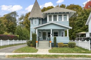 Milford Connecticut house with turrets and green exterior