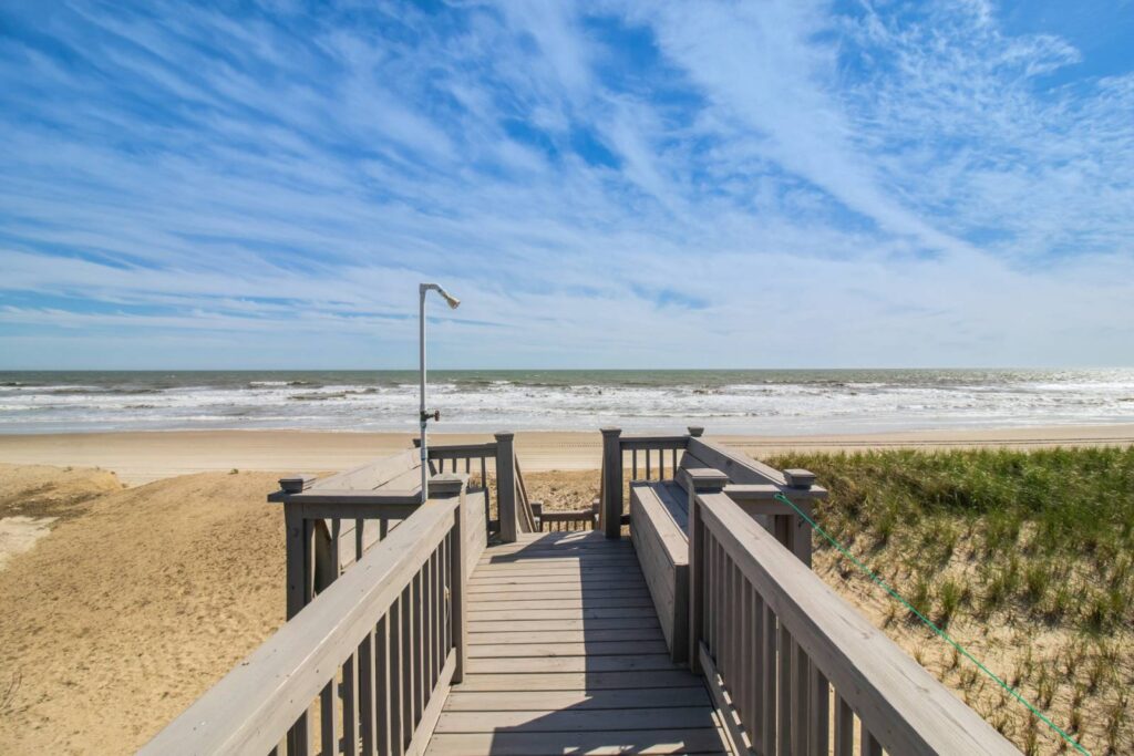 Walkway to the beach of an Oak Island vacation rental